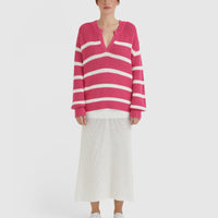 Lightweight crochet top in pomegranate, crafted from Merino wool and cotton blend.