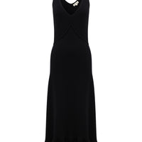 Elegant black wool dress featuring a fluted hem, ideal for sophisticated evening occasions.
