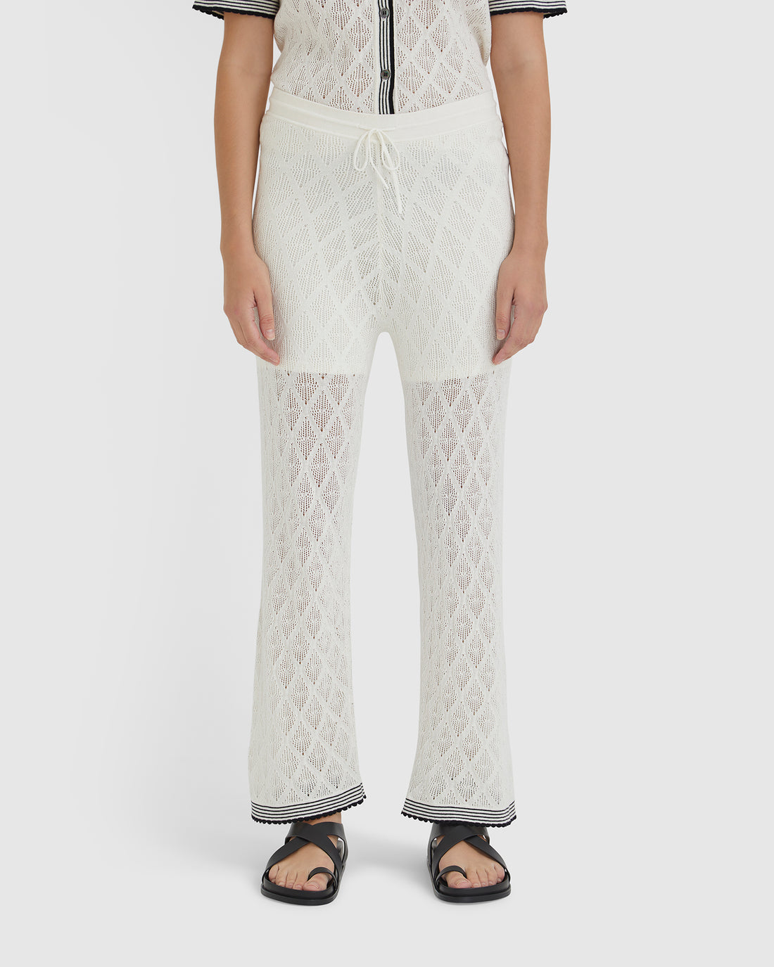 Chiara white lace pants with soft jersey and drawstring detail.