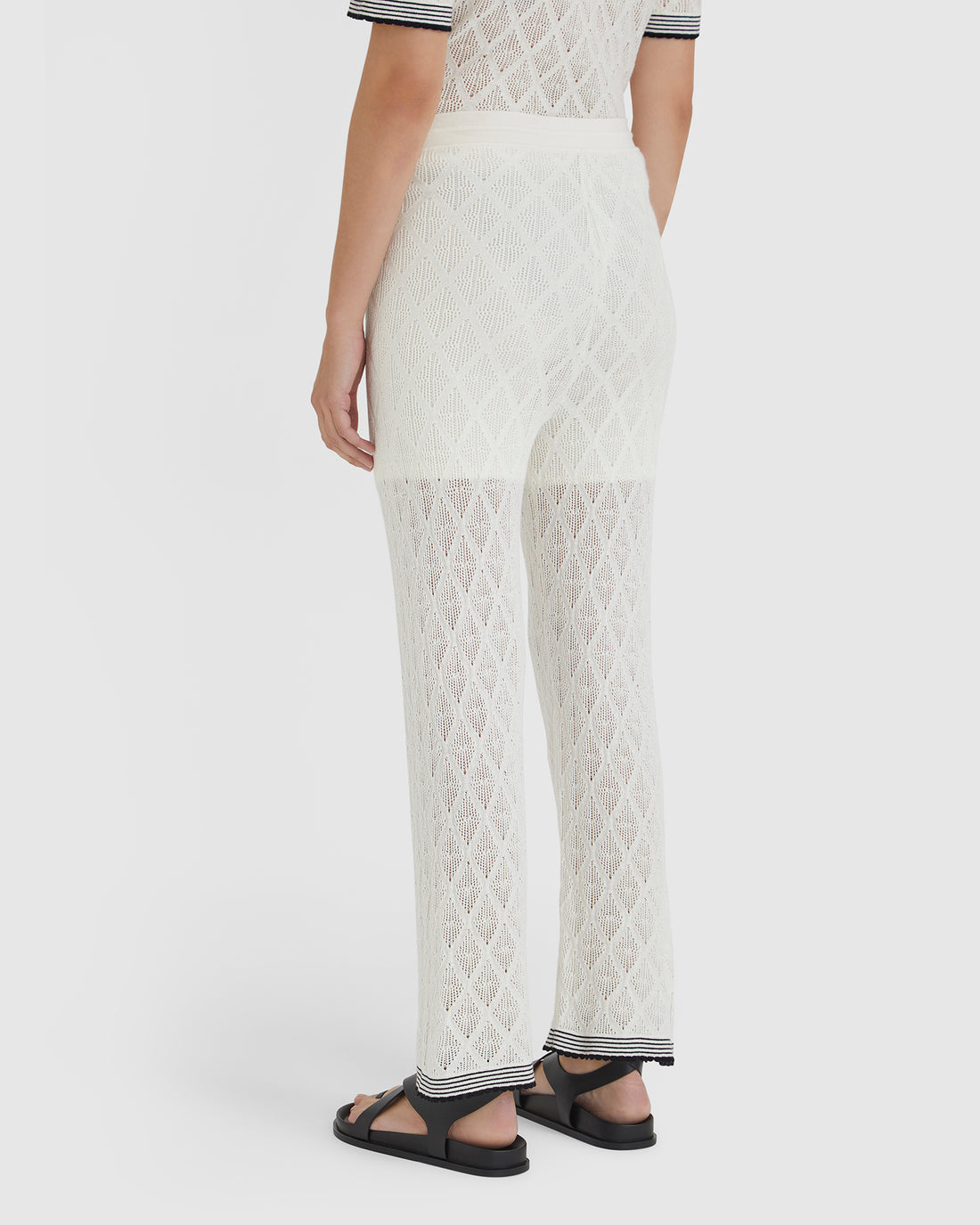 back view of wool white lace pants