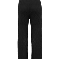 Back view of the black wool pants perfect for summer.