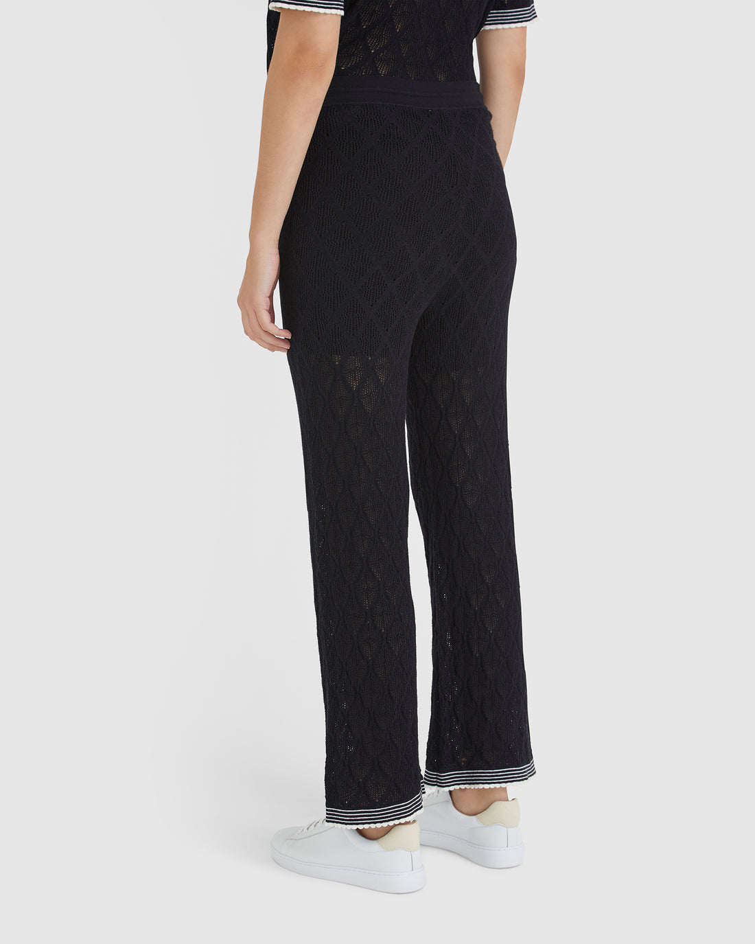 Elegant black lace pants with jersey waistband and drawstring, ideal for summer.