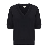 Close-up of pintuck detailing on the Elsa crochet top in black.