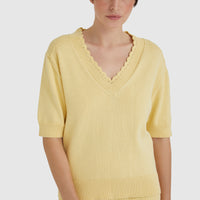 Elsa maize crochet top with V-neckline and hand-crocheted edging.