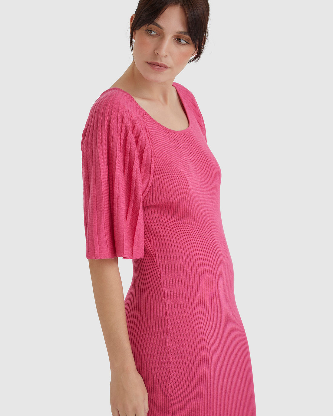 Pomegranate Fleur Pleat Sleeve Dress with fitted ribbed silhouette.