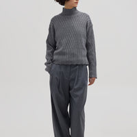 Model wearing the Grey Corded Rib High Neck Merino Sweater – cozy and breathable ladies wool sweater