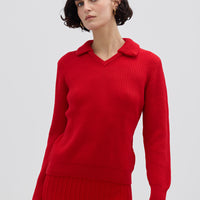 Model wearing the Red Ribbed V-Neck Merino Sweater – stylish and cozy ladies wool jumper
