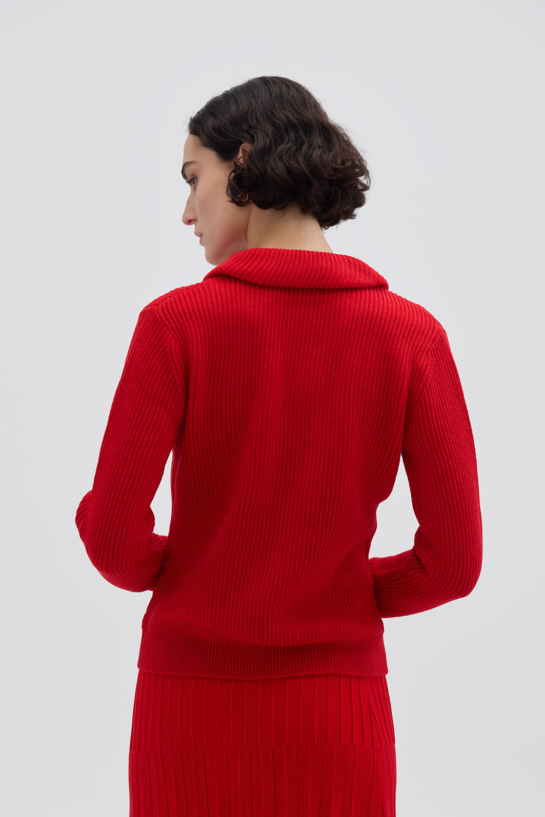 Vibrant Red Ladies Wool Jumper with ribbed texture – warm and sophisticated winter fashion