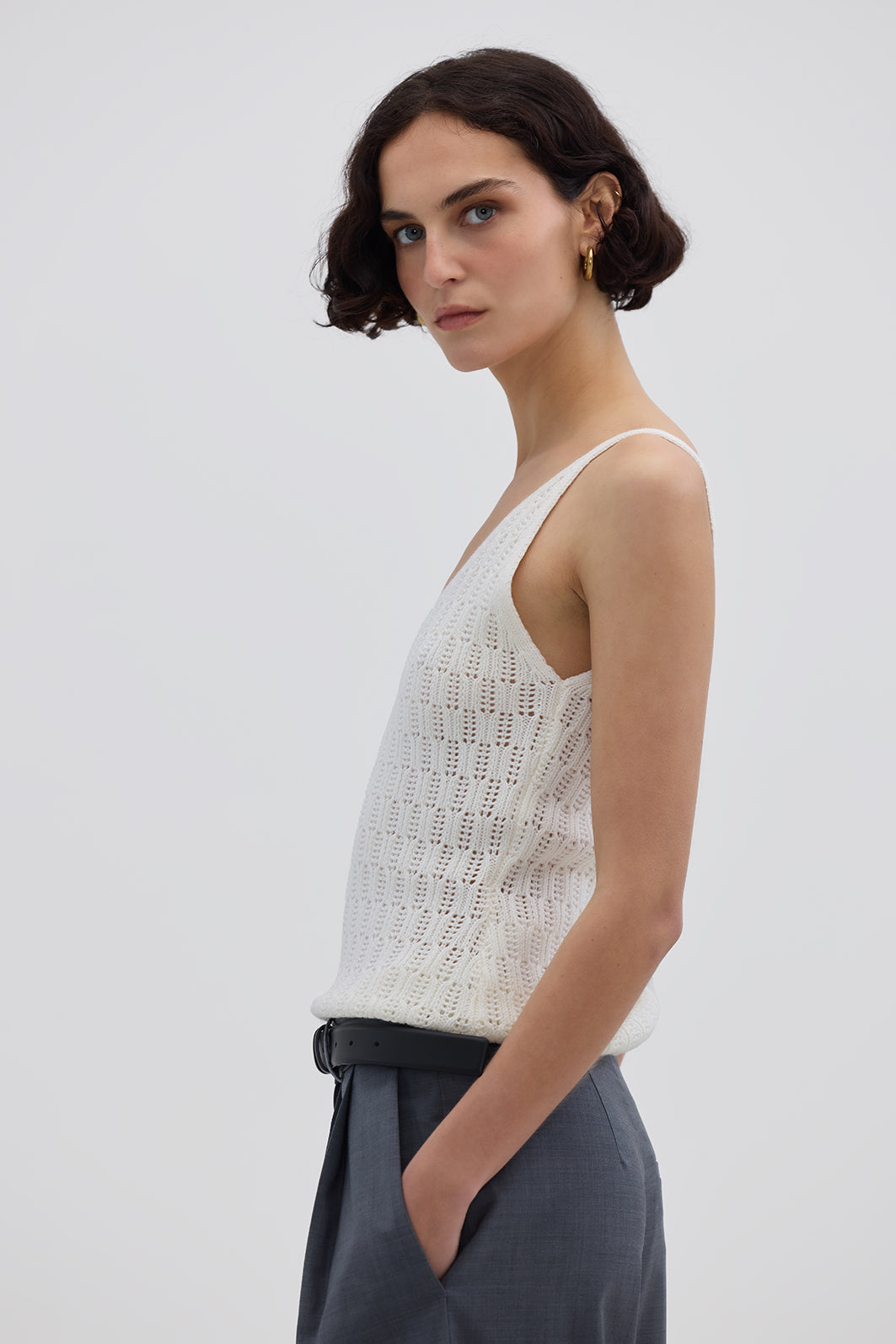 Side profile of model in Cream Wool Cami – structured and cozy merino knitwear