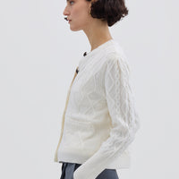 Side view of model in Cream Wool Cardigan – warm, lightweight, and effortlessly elegant