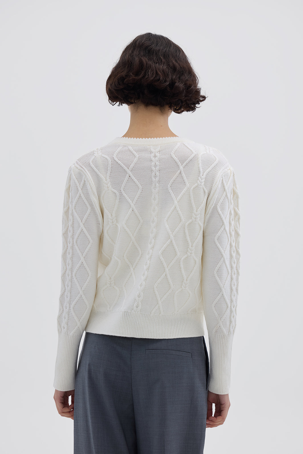 Ladies Wool Cardigan in Cream, styled open over a blouse – timeless and cozy layering piece