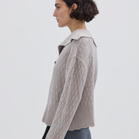 Side profile of model in Cream Wool Sweater – warm, polished, and stylish knitwear