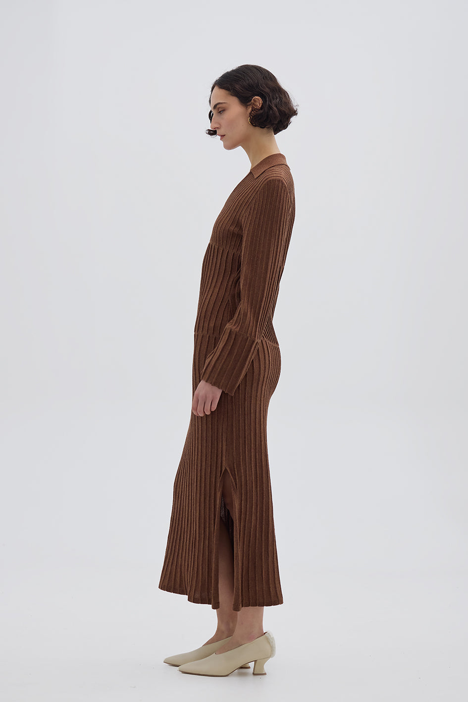 Side profile of model in Brown Merino Dress – structured, breathable, and effortlessly elegant