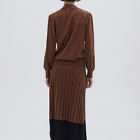 Ladies Midi Wool Skirt in Brown styled with a cozy sweater – warm and elegant knitwear