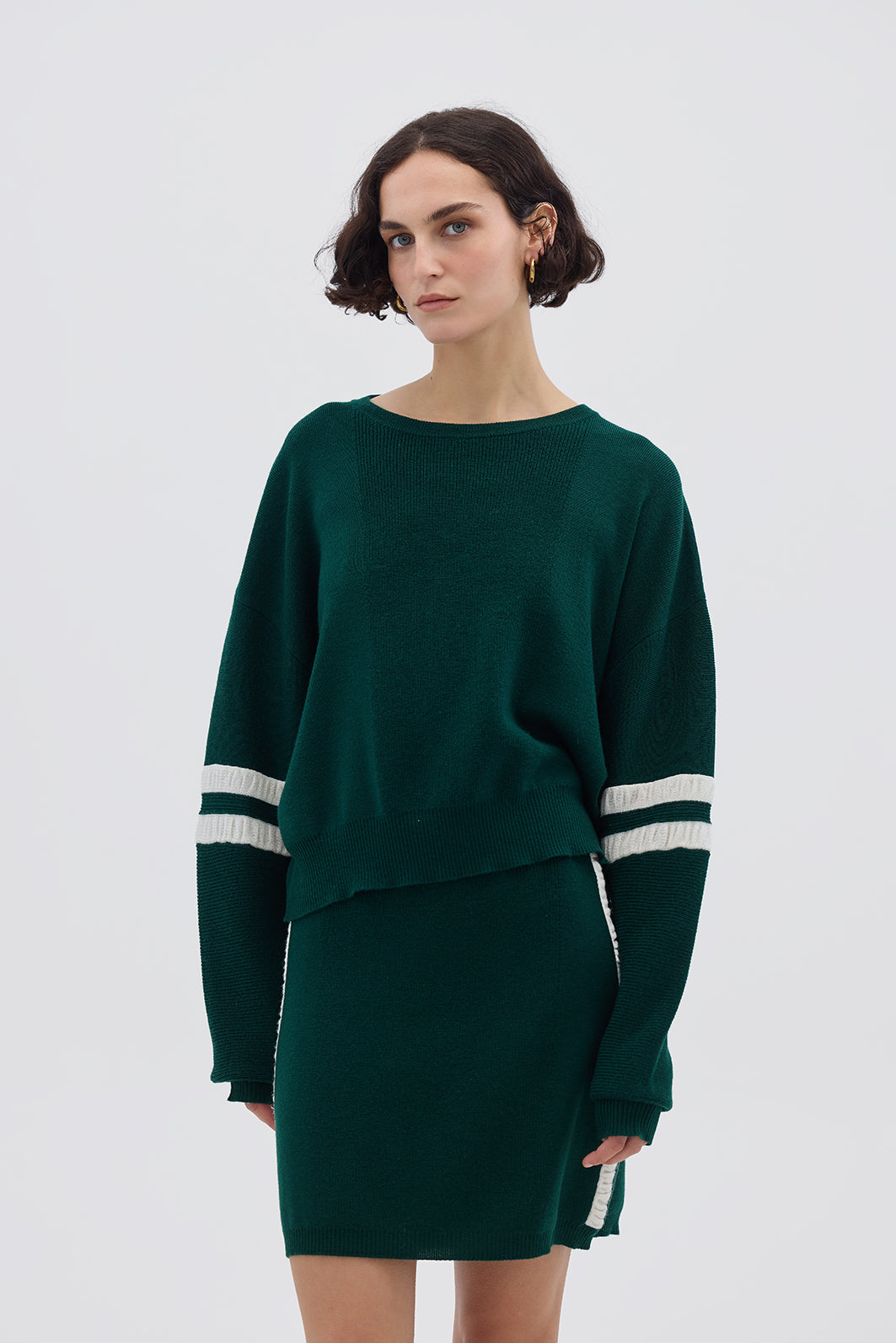 Model wearing the Emerald Ruched Striped Rib Merino Sweater – vibrant and cozy ladies wool sweater