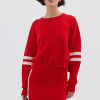 Model wearing the Red Ruched Striped Rib Merino Sweater – bold and stylish ladies wool sweater
