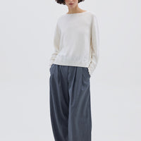Model wearing the Cream Core Merino Wool Sweater – soft and breathable ladies wool jumper