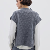Grey Sleeveless Wool Vest styled with a long-sleeve top – timeless and versatile winter outfit