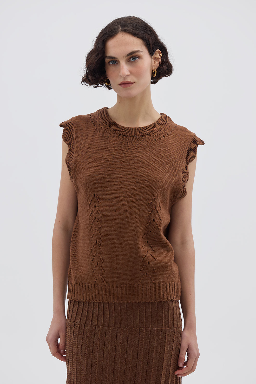 Model wearing the Walnut Scallop Vest – elegant ladies wool vest with scalloped sleeves