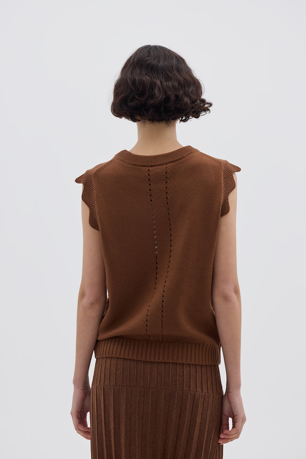 Ladies Knit Vest in Walnut styled over a blouse – refined and versatile layering piece