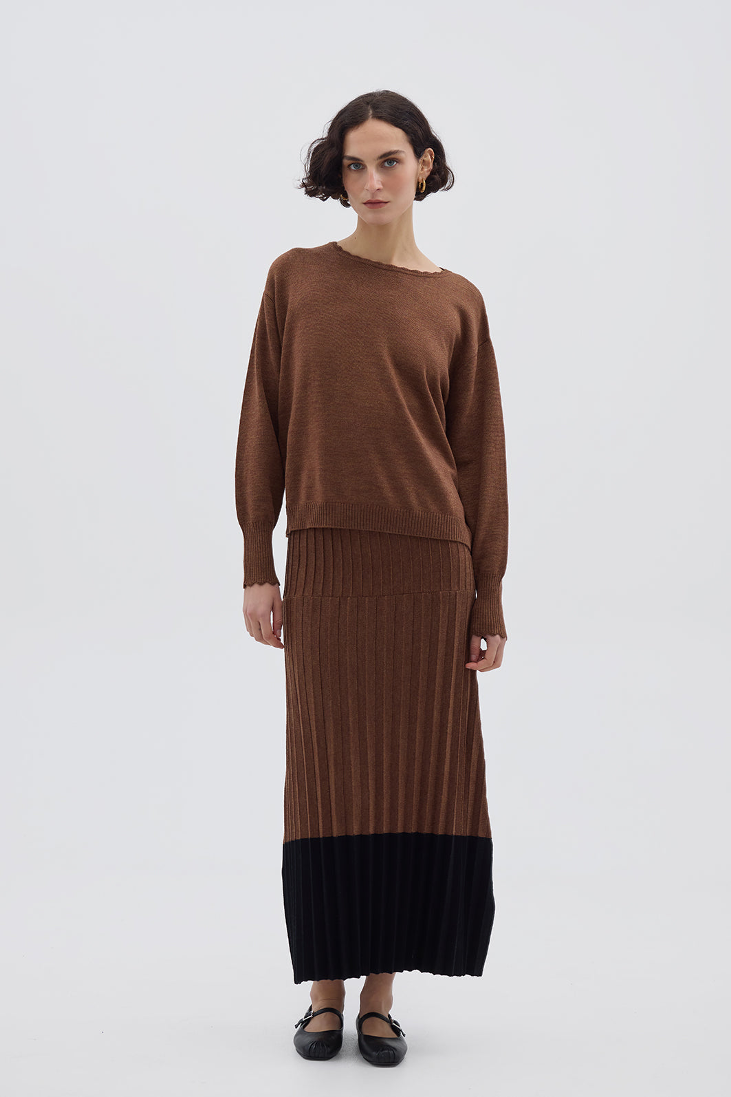 Model wearing the Core Merino Logo Sweater – elegant ladies wool jumper with subtle logo embroidery
