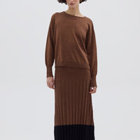 Model wearing the Core Merino Logo Sweater – elegant ladies wool jumper with subtle logo embroidery