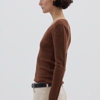 Side profile of model in Walnut Merino Skivvy – classic layering piece for year-round wear