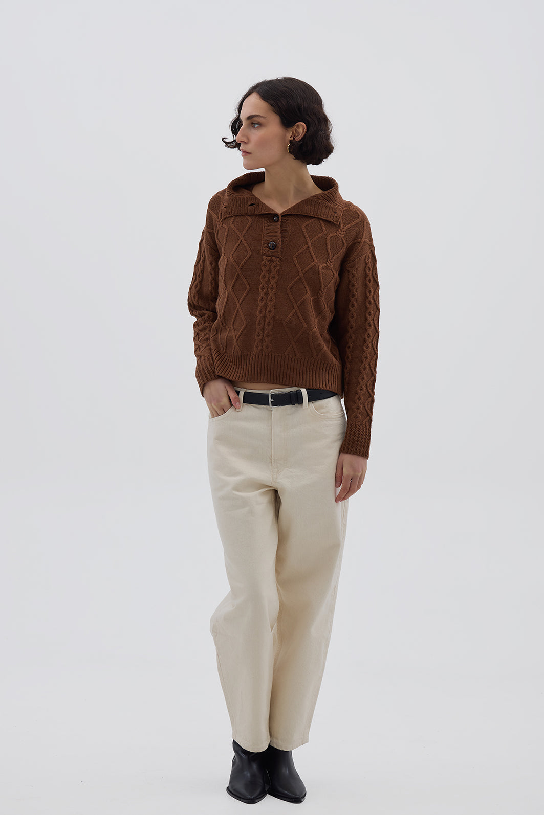 Model wearing the Brown Cable Heart Button Neck Merino Sweater – stylish and cozy ladies wool sweater