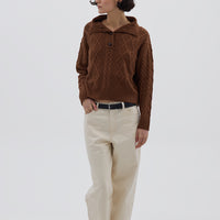 Model wearing the Brown Cable Heart Button Neck Merino Sweater – stylish and cozy ladies wool sweater