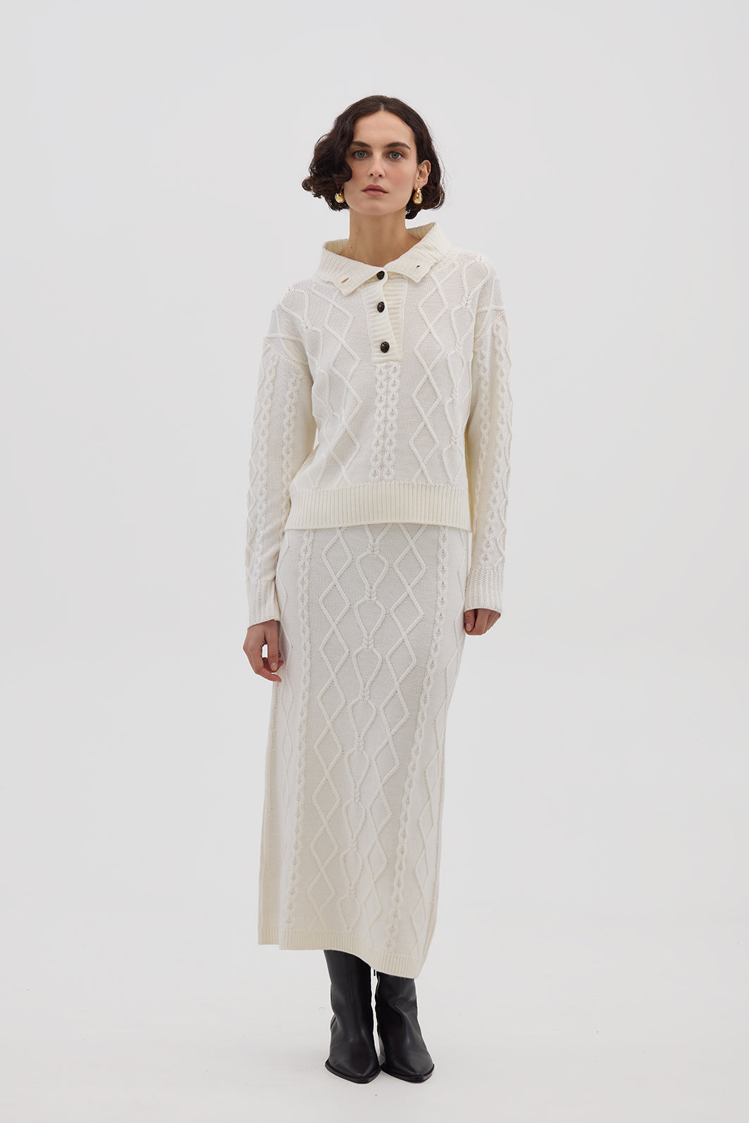 Model wearing the Cream Heart Cable Maxi Wool Skirt – soft and breathable merino wool skirt