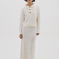 Model wearing the Cream Heart Cable Maxi Wool Skirt – soft and breathable merino wool skirt