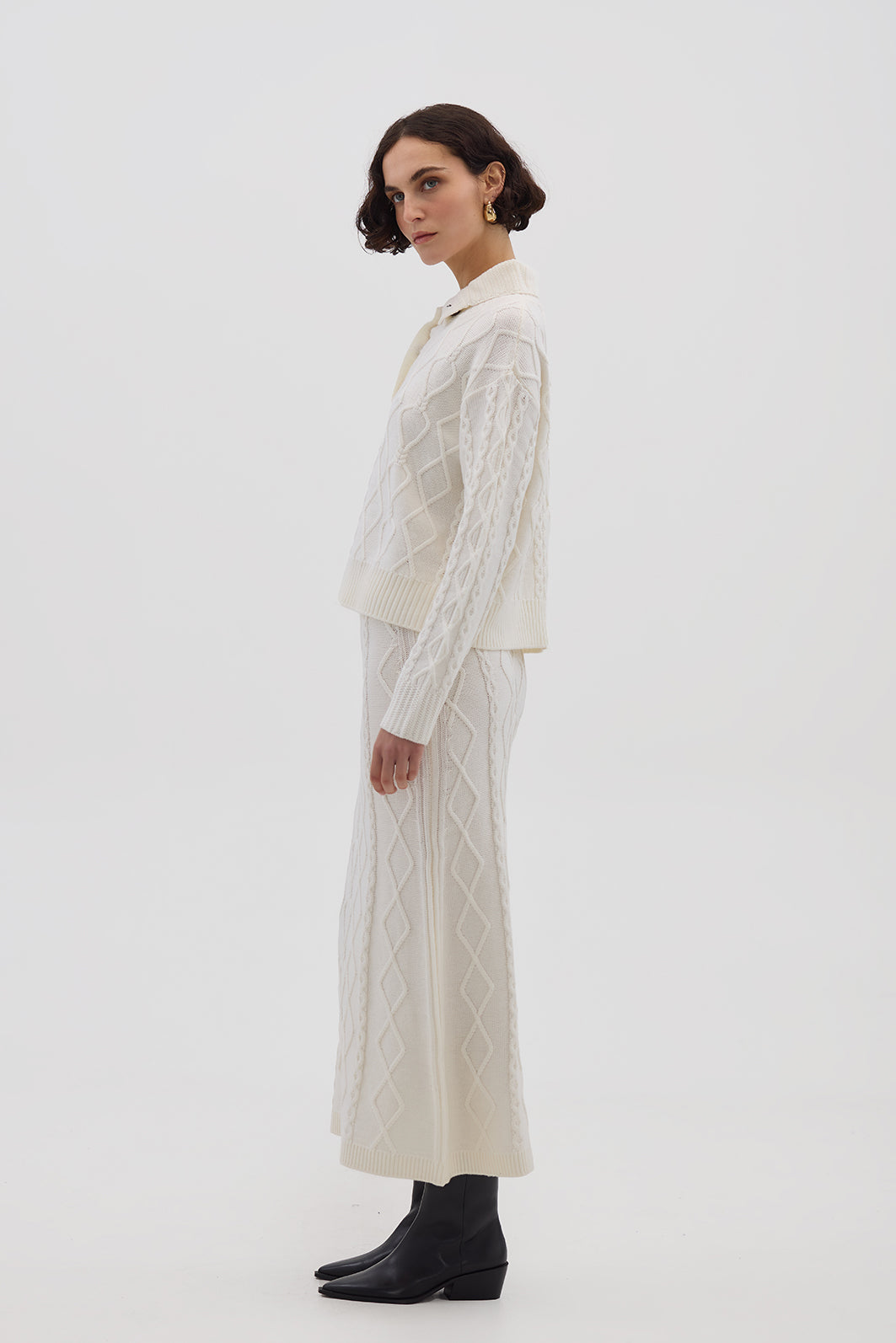 Side profile of model in Cream Merino Wool Skirt – classic and versatile winter styling