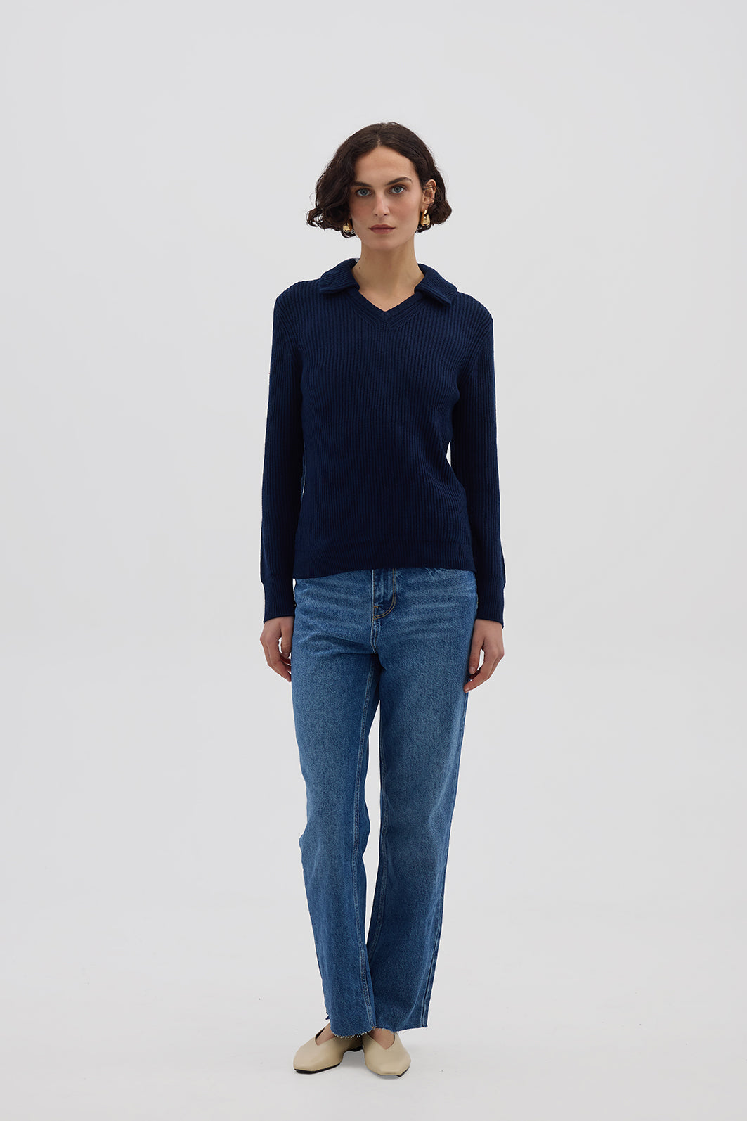 Model wearing the Navy Ribbed V-Neck Merino Sweater – soft and stylish ladies wool sweater