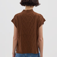 Brown Sleeveless Wool Vest styled with a knit sweater – warm and elegant
