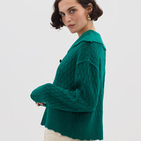 Side profile of model in Emerald Wool Sweater – warm, stylish, and cozy knitwear