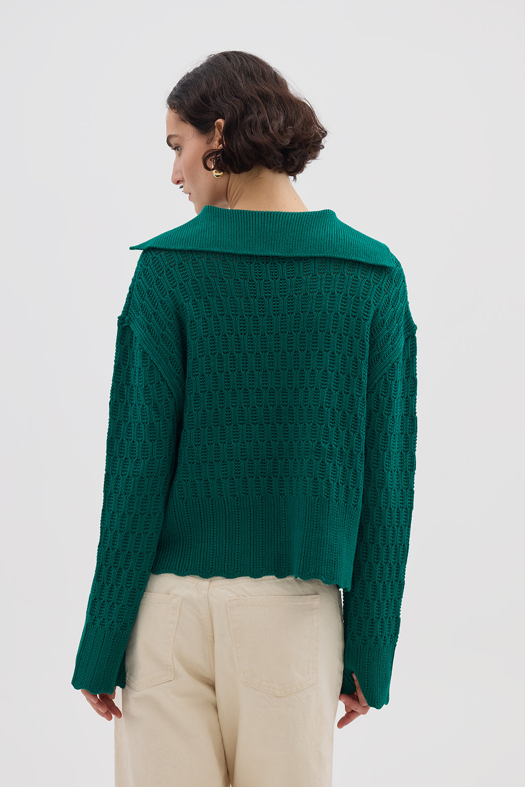 Ladies Wool Jumper in Emerald styled with high-waisted trousers – refined and classic look