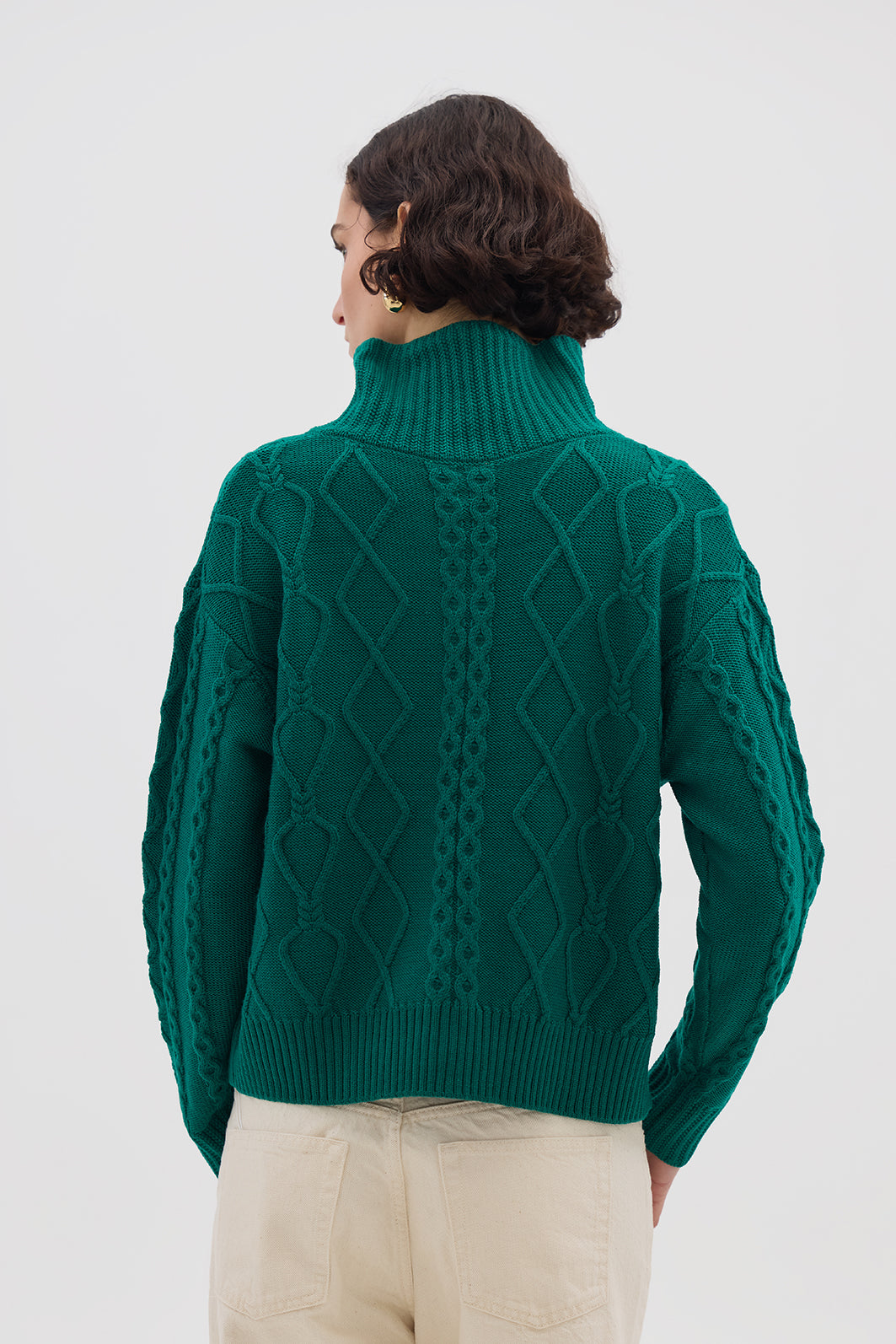 Ladies Wool Jumper in Emerald – intricate cable-knit texture with a button-neck design