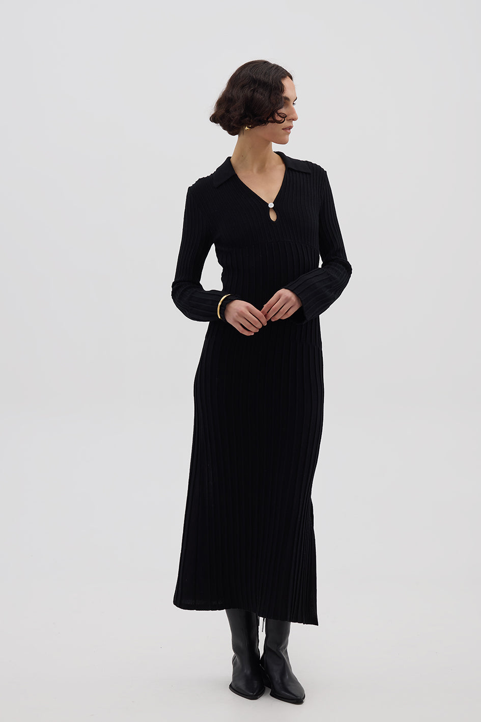 Model wearing the Black Engineered Rib Polo Wool Dress – refined and breathable Merino dress