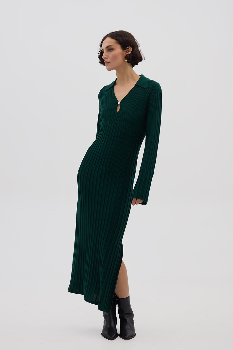 Model wearing the Emerald Engineered Rib Polo Wool Dress – elegant and breathable Merino dress