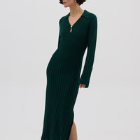 Model wearing the Emerald Engineered Rib Polo Wool Dress – elegant and breathable Merino dress