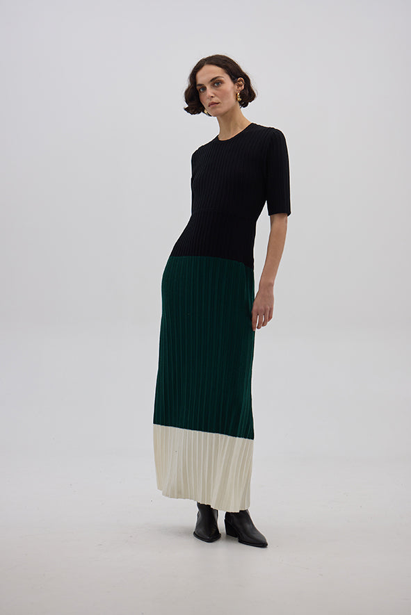 Model wearing the Black & Emerald Colour Block Wool Dress – sophisticated and breathable Merino dress