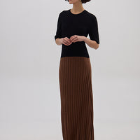 Model wearing the Black & Walnut Colour Block Wool Dress – elegant and breathable Merino dress