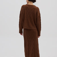 Ladies Maxi Skirt Knit in Brown styled with a neutral sweater – warm and versatile knitwear