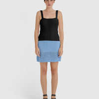 Classic black cami top in wool-silk blend, ideal for layering.