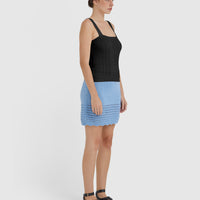 Side view of pointelle detail of wool cami top.