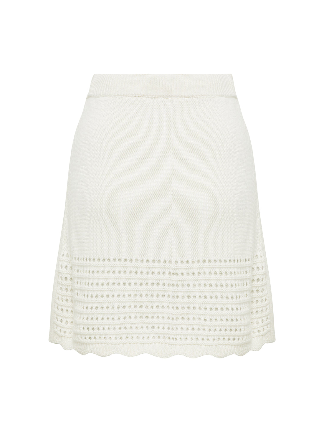 back view of mini crochet white skirt.