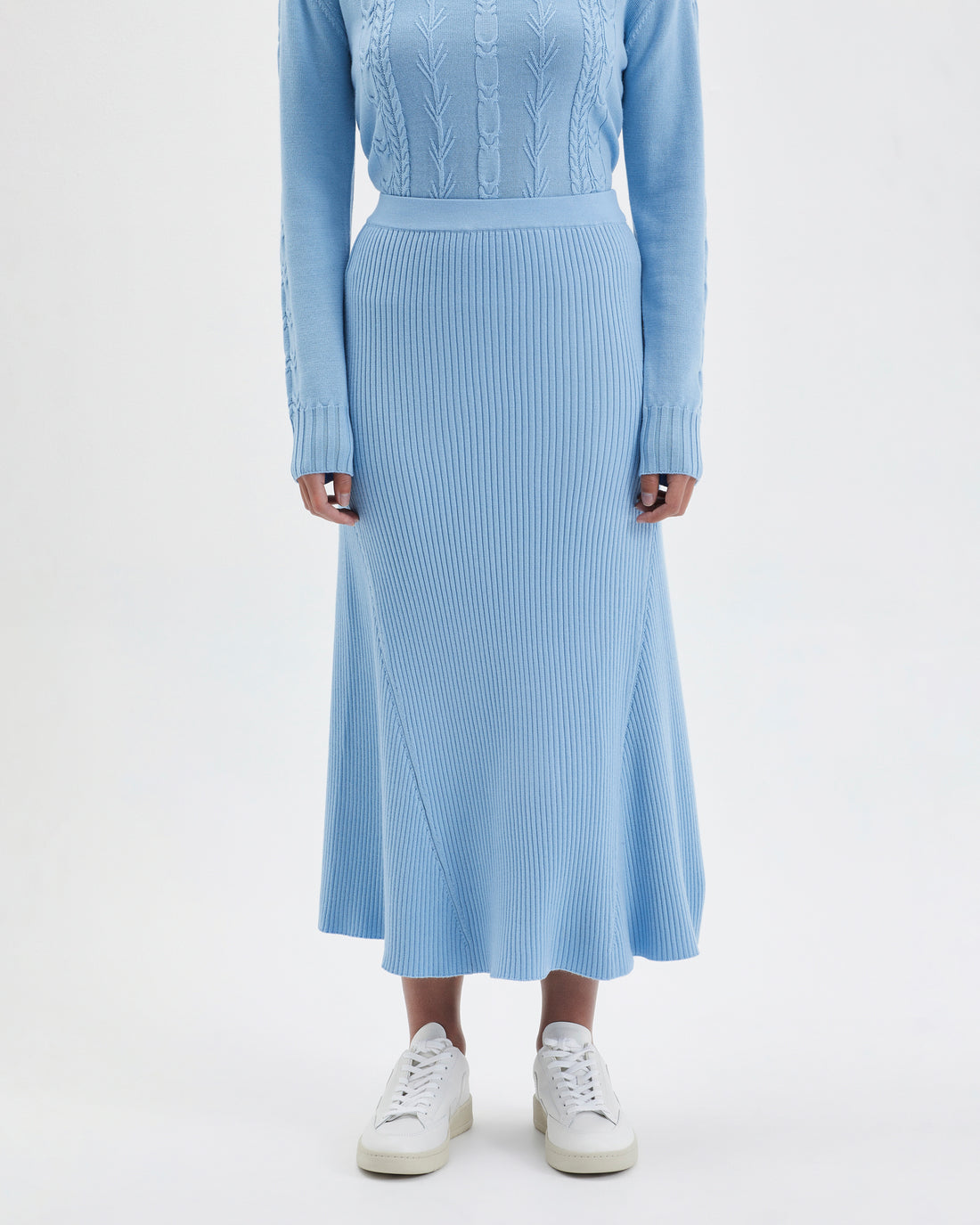 Elegant wool midi skirt in seafoam with a flared hem and soft knit.
