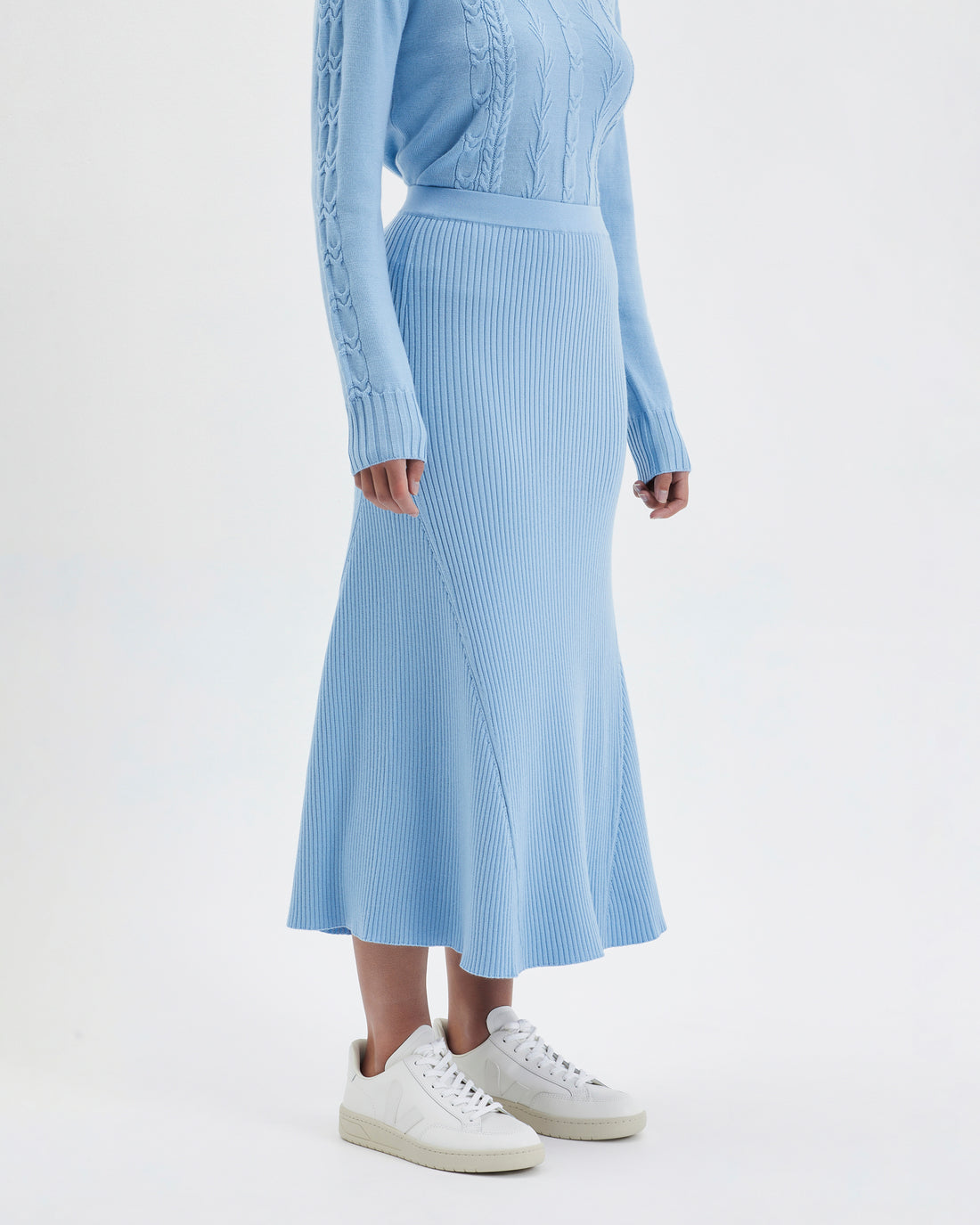 Sophisticated seafoam merino wool midi skirt with A-line silhouette.