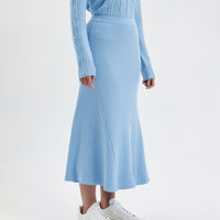 Sophisticated seafoam merino wool midi skirt with A-line silhouette.