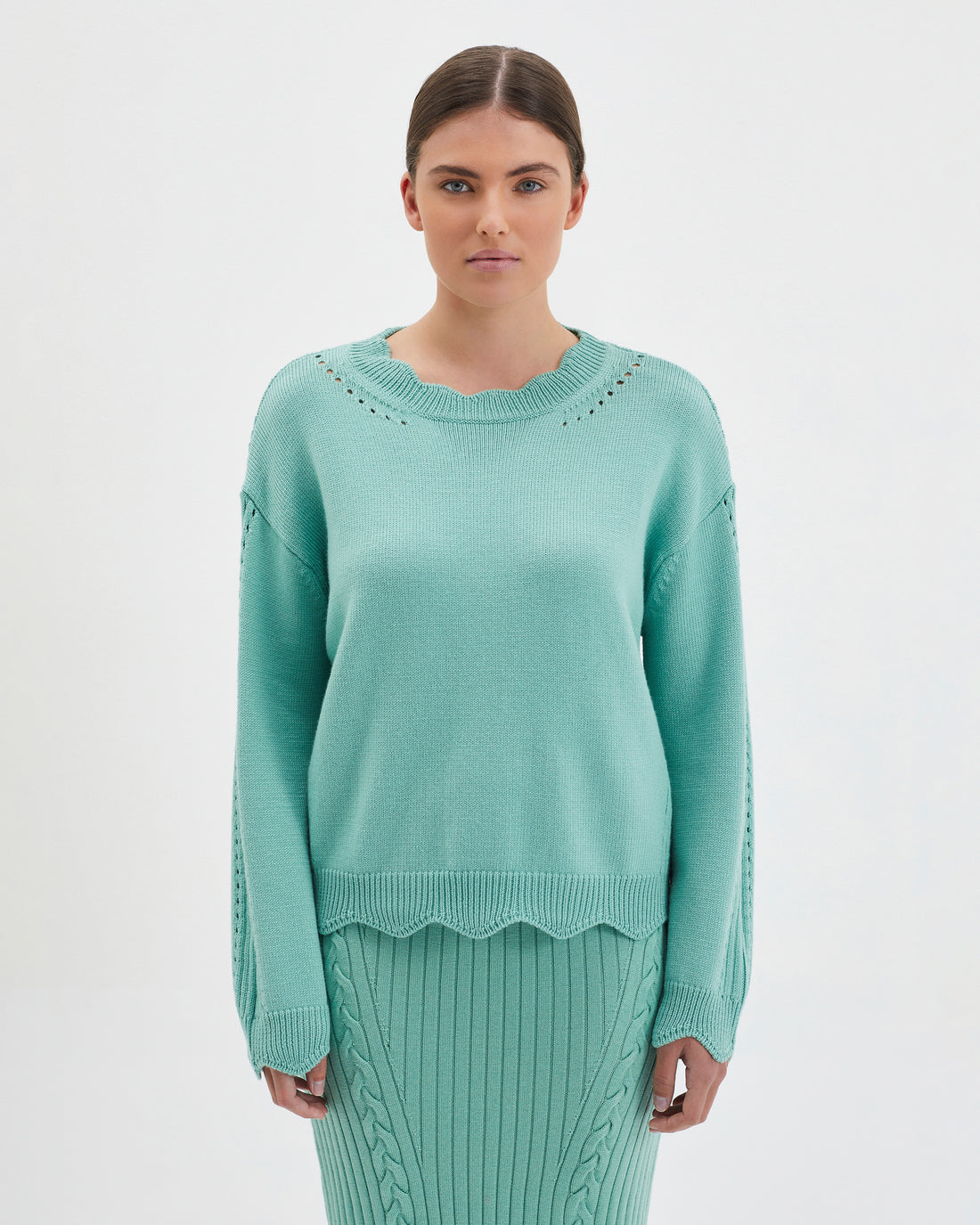 Scallop Wool Sweater in Sage with scalloped details on neckline and cuffs.